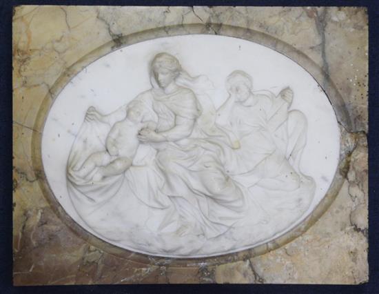 A 19th century Italian carved white marble relief plaque of The Holy Family, 19 x 15in.